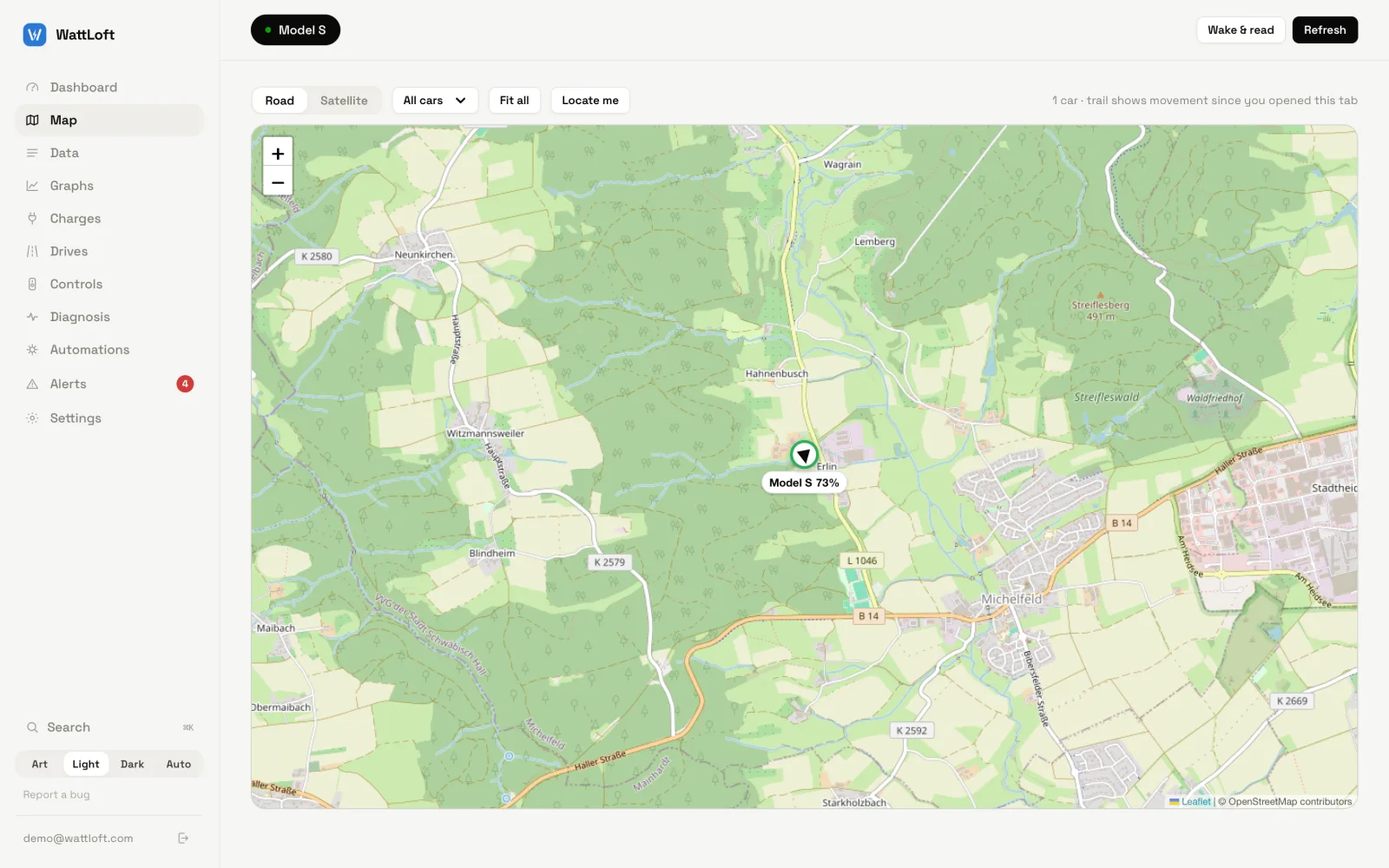 The web Map view: Road/Satellite toggle, All cars filter, Fit all and Locate me buttons, and a Model S marker with a heading arrow and 73% label